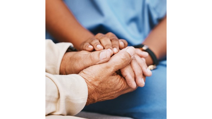 holding patients hands