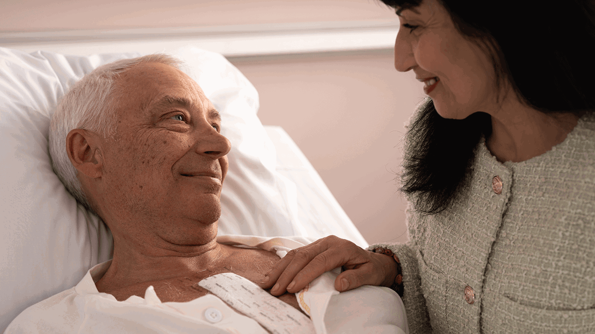 A photo of a happy patient with a post-op wound dressing.