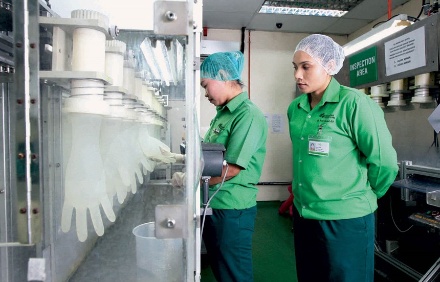 Employees during production of gloves